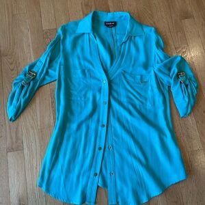 Bebe dress top with a zipper back. Color is like a seafoam greenish blue.